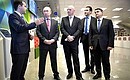During a visit to the FIFA World Cup FAN ID Distribution Centre. With Communications and Mass Media Minister Nikolai Nikiforov (left), FIFA President Gianni Infantino and Presidential Aide Igor Levitin (far right).