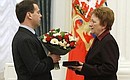 Presenting state decorations. Dmitry Medvedev presented the Gold Star medal to Lyudmila Shiryayeva, mother of captain Grigory Shiryayev, who was decorated posthumously.