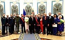 With the participants of the ceremony for presenting state decorations. Photo: Valery Sharifulin, TASS
