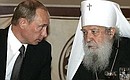At the reception in honour of the reunification of the Russian Orthodox Church. With the head of the Bishops\' Synod of the Russian Orthodox Church Abroad, Metropolitan Laurus.