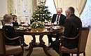 Vladimir Putin met with Artyom Palyanov, a boy who dreams of catching a bird's eye view of St Petersburg, his brother and father.