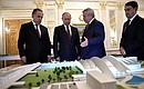 Before the joint meeting of the Council for the Development of Physical Culture and Sport and the 2018 FIFA World Cup Russia Local Organising Committee’s Supervisory Board, the President visited an exhibition on preparations at stadiums and airports of host cities for the 2018 FIFA World Cup.
