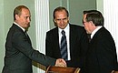 President Putin with Chairman of the Constitutional Court Valery Zorkin (centre) and Chairman of the Higher Arbitration Court Veniamin Yakovlev.