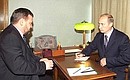 С главой администрации Чечни Ахматом Кадыровым.