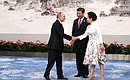 Vladimir Putin, President of China Xi Jinping and his spouse Peng Liyuan before the reception hosted by Chairman Xi Jinping for the BRICS leaders and heads of delegations of invited states.