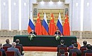 По итогам российско-китайских переговоров Владимир Путин и Си Цзиньпин сделали заявления для прессы. Фото ТАСС