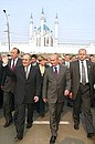 President Vladimir Putin and President of Tatarstan Mintimer Shaimiyev walking around the city.
