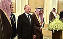 Vladimir Putin arrived in Saudi Arabia on a state visit. With King Salman bin Abdulaziz Al Saud of Saudi Arabia.