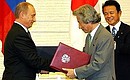 At a ceremony of signing Russian-Japanese documents. With Japanese Prime Minister Junichiro Koizumi.
