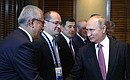 At a meeting with President of Uzbekistan Shavkat Mirziyoyev.