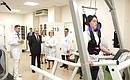 Medical Rehabilitation Department. Demonstration of patient treatment using a virtual reality rehabilitation simulator. Department Head Boris Polyayev (left) explains the treatment. Photo: Alexander Ryumin, TASS