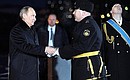 Vladimir Putin presents the Order of Nakhimov to nuclear-powered missile cruiser Pyotr Veliky.