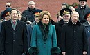 With State Duma Speaker Sergei Naryshkin and Council of Federation Chairperson Valentina Matviyenko at the ceremony of laying a wreath at the Tomb of the Unknown Soldier.