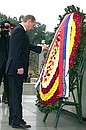 President Putin laying a wreath at the Fallen Heroes Memorial.