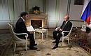 В преддверии визита в Китайскую Народную Республику Владимир Путин ответил на вопросы Председателя Медиакорпорации Китая Шэнь Хайсюна.