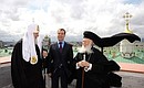 With Patriarch Kirill of Moscow and All Russia and Ecumenical Patriarch Bartholomew I of Constantinople.