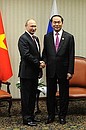 With President of Vietnam Tran Dai Quang.