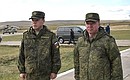 Chief of the General Staff of Russia’s Armed Forces, First Deputy Defence Minister Valery Gerasimov and Commander of the Eastern Military District Alexander Zhuravlyov, right, at Vostok-2018 military manoeuvres.