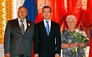 Dmitry Medvedev presents the Order of Parental Glory to Maria and Andrei Gamm, who are raising 7 children.