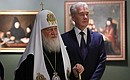 Patriarch Kirill of Moscow and All Russia and Moscow Mayor Sergei Sobyanin at the exhibition Treasures of Russian Museums.