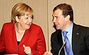 Meeting with Russian and German business leaders. With Federal Chancellor of Germany Angela Merkel.