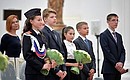 At a ceremony presentating passports to young citizens of Russia.