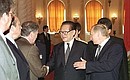 President Putin with Chinese President Jiang Zemin during the presentation of members of the Russian delegation and participants in expanded Russian-Chinese negotiations.