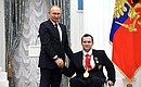 Presenting state decorations to winners of the 2020 Summer Paralympic Games in Tokyo. Dmitry Chernyaev, swimming champion of the Paralympics, receives the Order of Friendship. Photo: RIA Novosti
