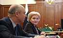 Finance Minister Anton Siluanov and Deputy Prime Minister Olga Golodets before the meeting on healthcare development.