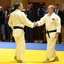 Vladimir Putin took part in a training session with judo players. With Russia’s national judo team head coach Ezio Gamba.