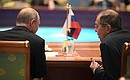 С Министром иностранных дел Сергеем Лавровым перед началом заседания Совета глав государств Содружества Независимых Государств в расширенном составе.