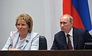 At a Federation Council meeting. With Chairwoman of the Council of Federation Valentina Matviyenko.