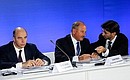 Before the start of a meeting of the Commission for Modernisation and Technological Development of Russia’s Economy. From left to right: Acting Finance Minister Anton Siluanov, Vnesheconombank Chairman Vladimir Dmitriev, and Chairman of the Board of Directors of RU-COM Business Group Mikhail Abyzov.
