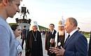 After the ceremony unveiling the memorial complex Prince Alexander Nevsky and his Retinue Vladimir Putin briefly talked to representatives of the Russian Student Brigades and the Volunteers of Culture movement.