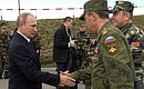 At the Gozhsky test ground during the final stage of the Zapad-2013 Russian-Belarusian strategic military exercises. With Chief of the General Staff of Russia’s Armed Forces and First Deputy Defence Minister Valery Gerasimov and Belarusian Defence Minister Yury Zhadobin.