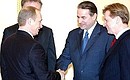 President Putin with Jacques Rogge, President of the International Olympic Committee, and Leonid Tyagachyov (right), President of the Russian Olympic Committee.