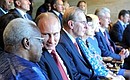 At the opening ceremony of the World Athletics Championship. With President of the International Olympic Committee Jacques Rogge and President of the International Association of Athletics Federations (IAAF) Lamine Diack (left).