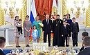 Natalia and Pavel Tyurin from Khabarovsk Territory rec are awarded eived the Order of Parental Glory.