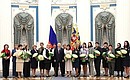 Group photo following the ceremony for presenting state decorations on International Women’s Day. Photo: Mikhail Tereshenko, TASS