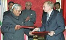 With Prime Minister Atal Bihari Vajpayee of India at a ceremony of signing bilateral documents.