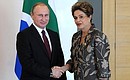 Before the start of an informal meeting of the BRICS leaders. With President of Brazil Dilma Rousseff.