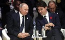 С Премьер-министром Канады Джастином Трюдо на пленарном заседании Парижского форума мира.