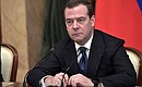 At a meeting with Government members. Prime Minister Dmitry Medvedev.