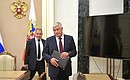 Before the meeting with permanent members of the Security Council. Interior Minister Vladimir Kolokoltsev and Defence Minister Sergei Shoigu.