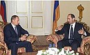 President Vladimir Putin with Armenian President Robert Kocharian.
