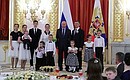 Presenting the order to the Shutylev family from the Republic of Khakassia.