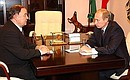 President Putin meeting with Khazret Sovmen, President of Adygheya.