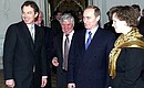 Vladimir Putin and British Prime Minister Tony Blair examining Petrodvorets.