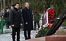 Laying flowers at a common grave for Soviet soldiers. With Governor of Moscow Region Andrei Vorobyov.