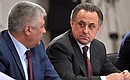 Interior Minister Vladimir Kolokoltsev and Sports Minister Vitaly Mutko at the meeting of the Council for the Development of Physical Culture and Sport.